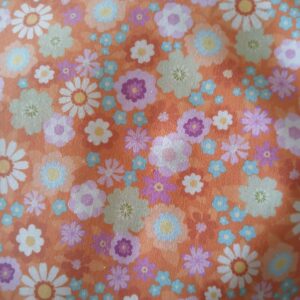 Tissu éventail motif fleurs rétro orange mauve bleu