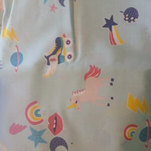 Tissu éventail motif disco licorne étoiles fond menthe